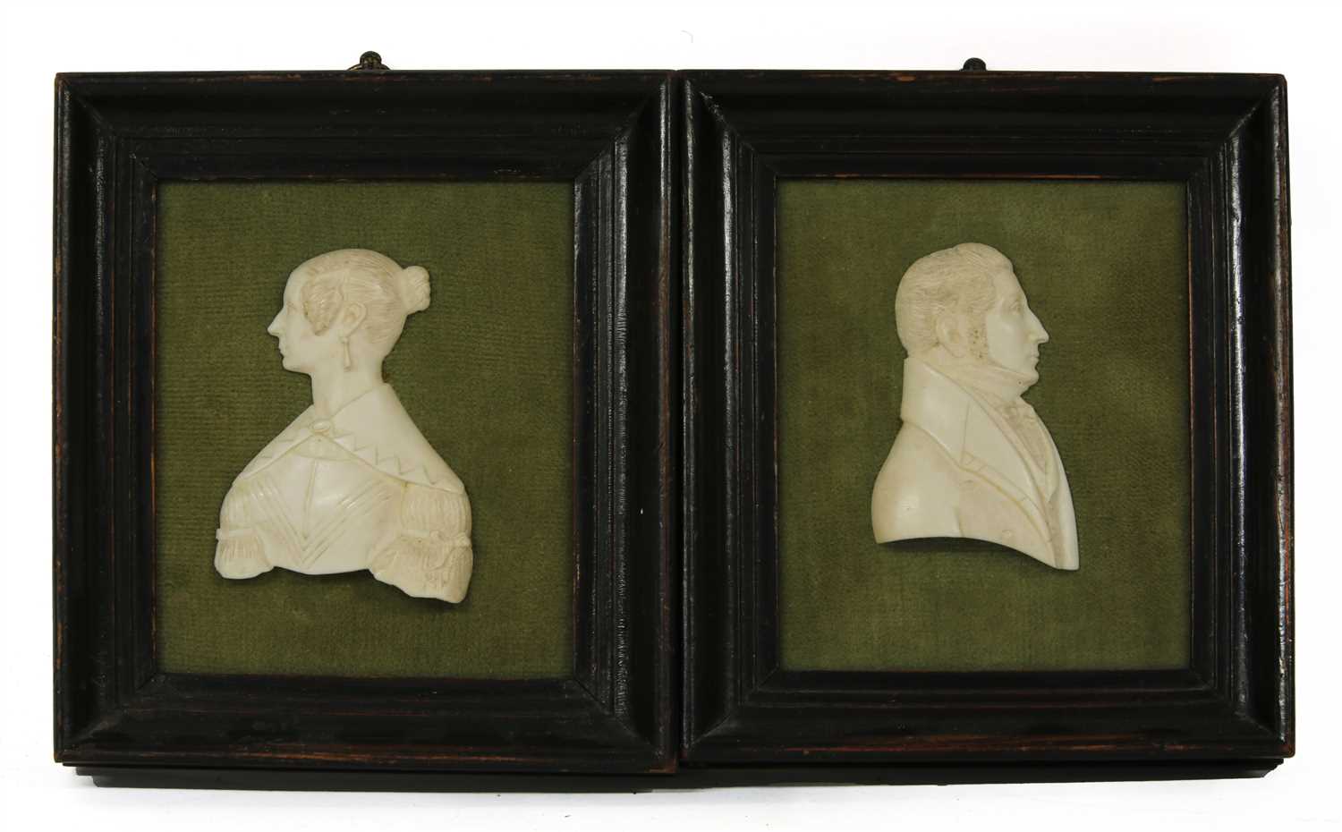 Lot 162 - A pair of 19th Century Dieppe ivory profile portraits depicting man and woman