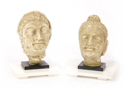 Lot 123 - Two Indian carved stone heads