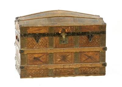 Lot 614 - A dome top travelling trunk