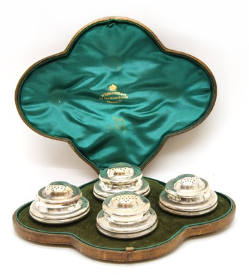 Lot 99 - A cased set of silver
pepperettes