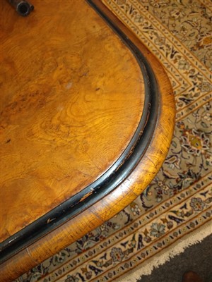 Lot 330 - A Victorian pollard oak and ebonised wind-out extending dining table