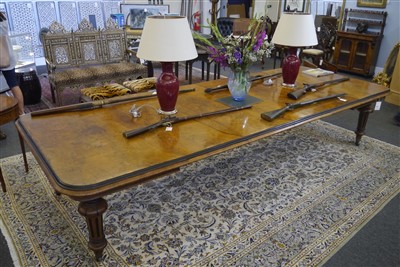 Lot 330 - A Victorian pollard oak and ebonised wind-out extending dining table