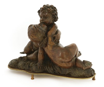 Lot 369 - A Venetian carved walnut figural group