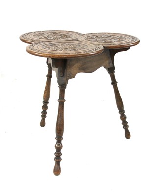 Lot 636 - A Victorian carved oak table