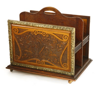 Lot 808 - A carved oak and gilt gesso three-division canterbury