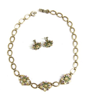 Lot 26 - A Symmetalic sterling silver and 14 carat gold enamelled flowerhead necklace