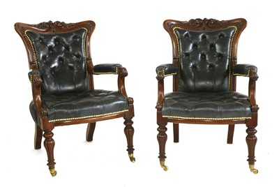 Lot 143 - A pair of mahogany library armchairs