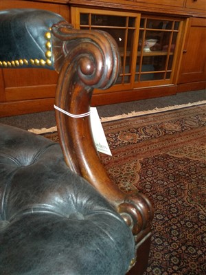 Lot 143 - A pair of mahogany library armchairs