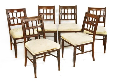 Lot 52 - A set of six oak dining chairs