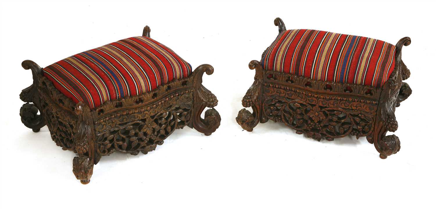 Lot 457 - A pair of Indian rosewood footstools
