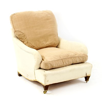 Lot 397 - A low Howard style armchair