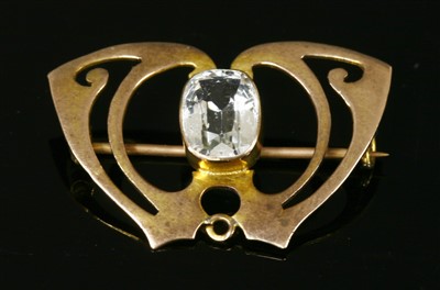 Lot 96 - A gold Arts and Crafts aquamarine brooch, c.1900