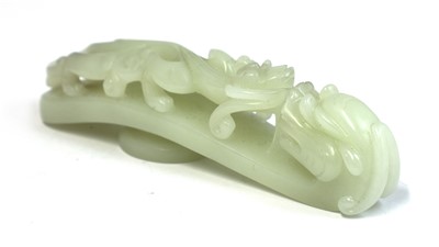 Lot 321 - A Chinese jade belt hook