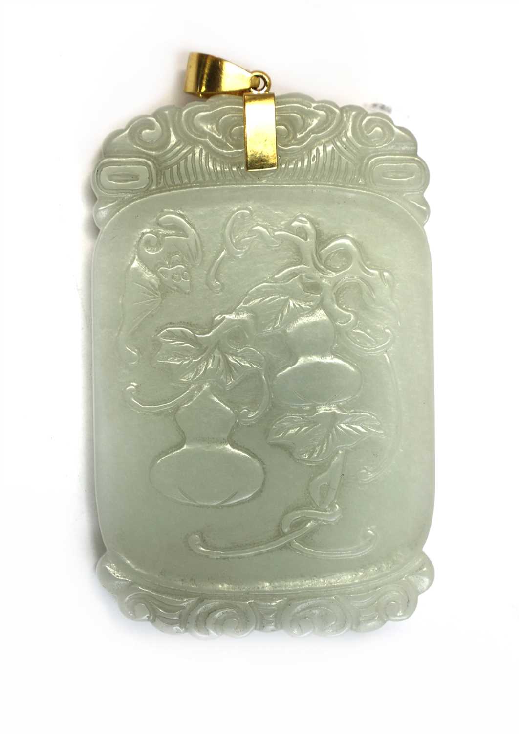 Lot 313 - A Chinese jade pendant