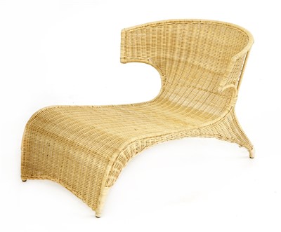 Lot 574 - A rattan lounge chair