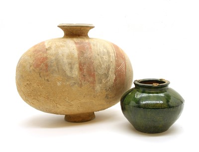 Lot 236 - A Chinese earthenware cocoon jar