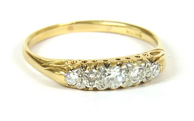 Lot 11 - A five stone diamond ring