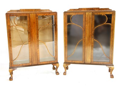Lot 364 - A pair of Art Deco walnut display cabinets