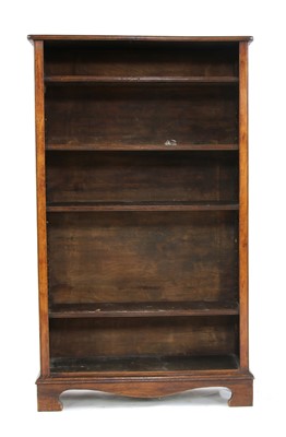 Lot 676 - A walnut open bookcase