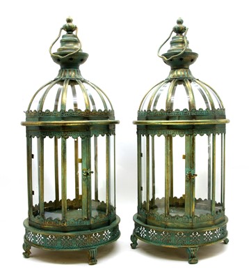 Lot 218 - A pair of multi-faceted green patented metal hanging lanterns