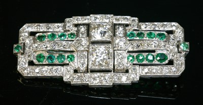 Lot 203 - An Art Deco emerald and diamond plaque brooch, c.1925