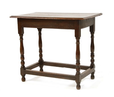 Lot 679 - An 18th century oak occasional table