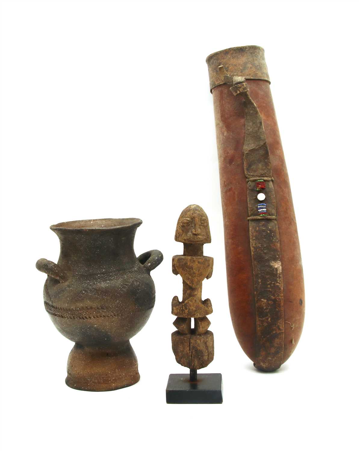 Lot 229 - A West African (?) carved figure on stand