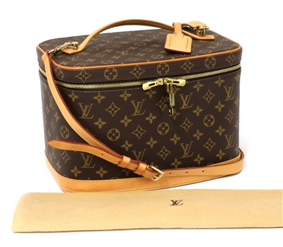 Lot 712 - A Louis Vuitton monogrammed soft-sided beauty case