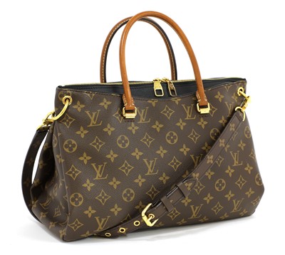 Lot 674 - A Louis Vuitton monogrammed Pallas shopper bag