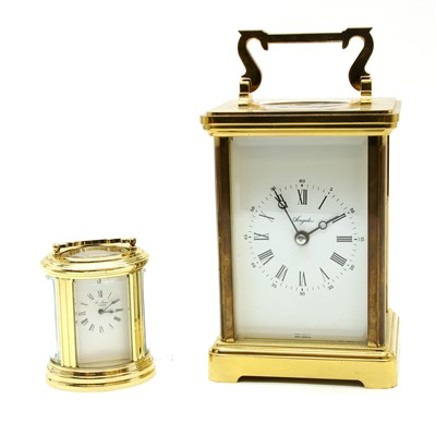 Lot 127 - A large brass carriage clock