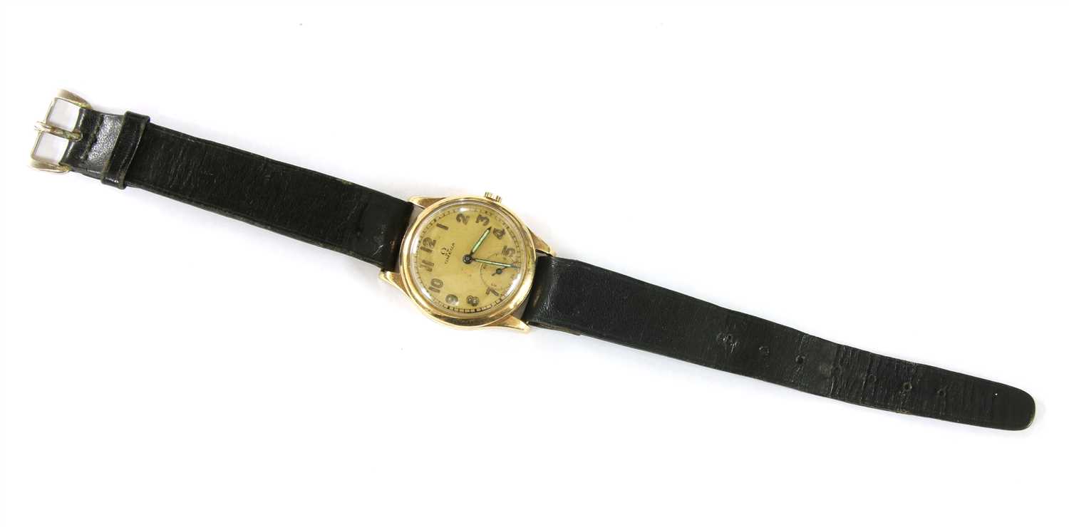 Lot 10 - A 9ct gold Omega gents strap watch