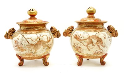Lot 219 - A pair of Kutani vases and covers