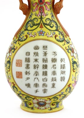 Lot 81 - A Chinese imperial inscribed famille rose wall vase