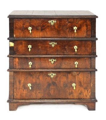 Lot 670 - An oak and walnut transitional chest