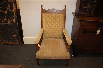 Lot 58 - A pair of Arts and Crafts oak armchairs