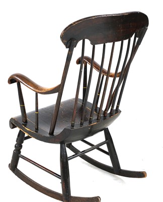 Lot 626 - An American painted stick-back rocking chair