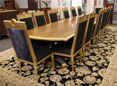 Lot 347 - A large continental quadruple pedestal dining table