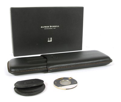 Lot 94 - An Alfred Dunhill black leather three division cigar case