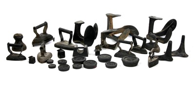 Lot 204A - A quantity of cast iron irons
