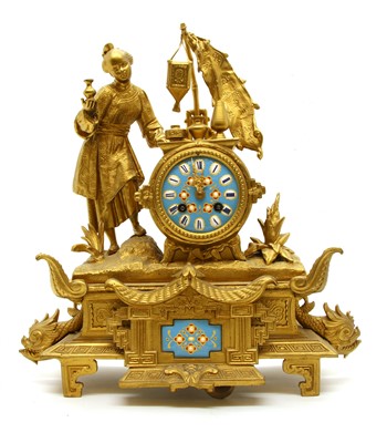 Lot 220 - A French style gilt metal mantel clock
