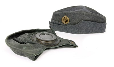 Lot 1312A - A WWl Royal Flying Corps side cap and a WWll pilot's leather flying helmet