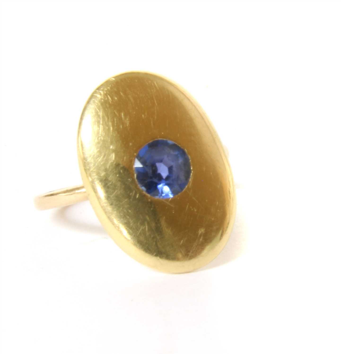 Lot 1 - An oval cufflink later converted to a ring