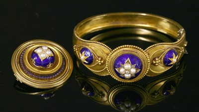 Lot 28 - A cased Victorian gold split pearl, diamond and enamel bangle, c.1860