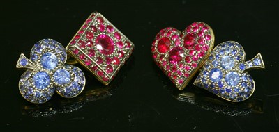 Lot 232 - A pair of gold ruby and sapphire set playing card suit cufflinks