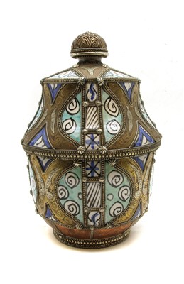 Lot 501 - A late 19th early 20th Moroccan ‘Jobbana’ ceramic lidded butter pot