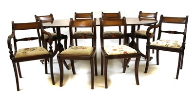 Lot 328 - A Regency style mahogany twin pedestal table
