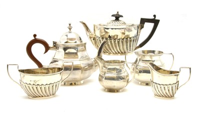 Lot 106 - A three piece silver bachelors tea service