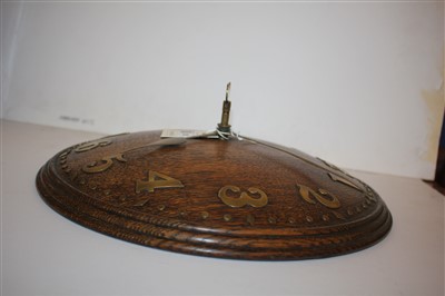 Lot 186 - An Heal's oak convex wall clock