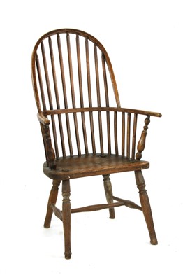 Lot 337 - A 19th century elm and ash Windsor double bow back armchair