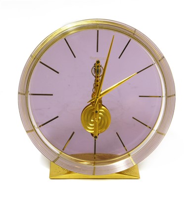 Lot 435 - A Jaeger-LeCoultre perspex and gilt metal skeleton table clock
